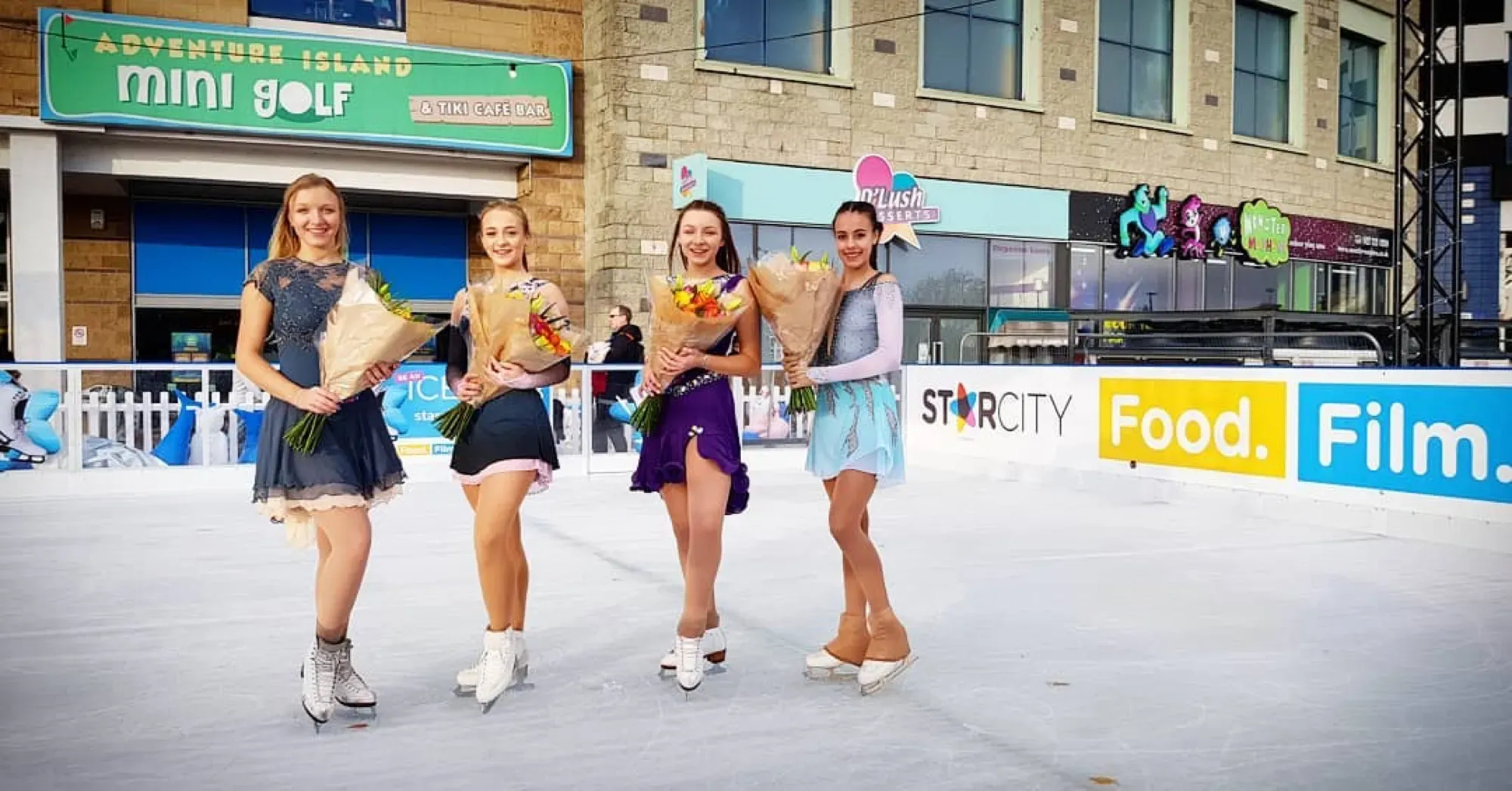Skaters performing a routine at StarCity Birmingham