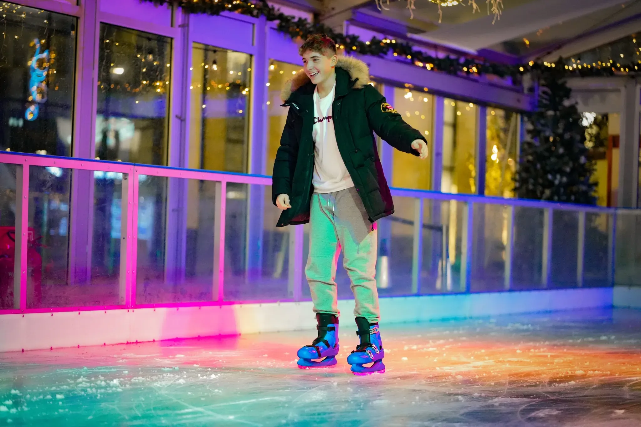 A skater gliding past the barriers at the Woking rink